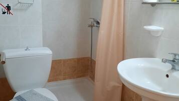 Studio (3 Adults) | Bathroom | Shower, free toiletries, hair dryer, towels