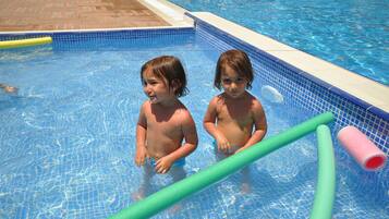 Outdoor pool, pool umbrellas, pool loungers