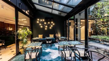 Breakfast, lunch, dinner served; garden views