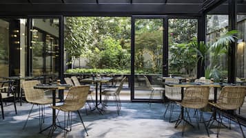 Breakfast, lunch, dinner served; garden views