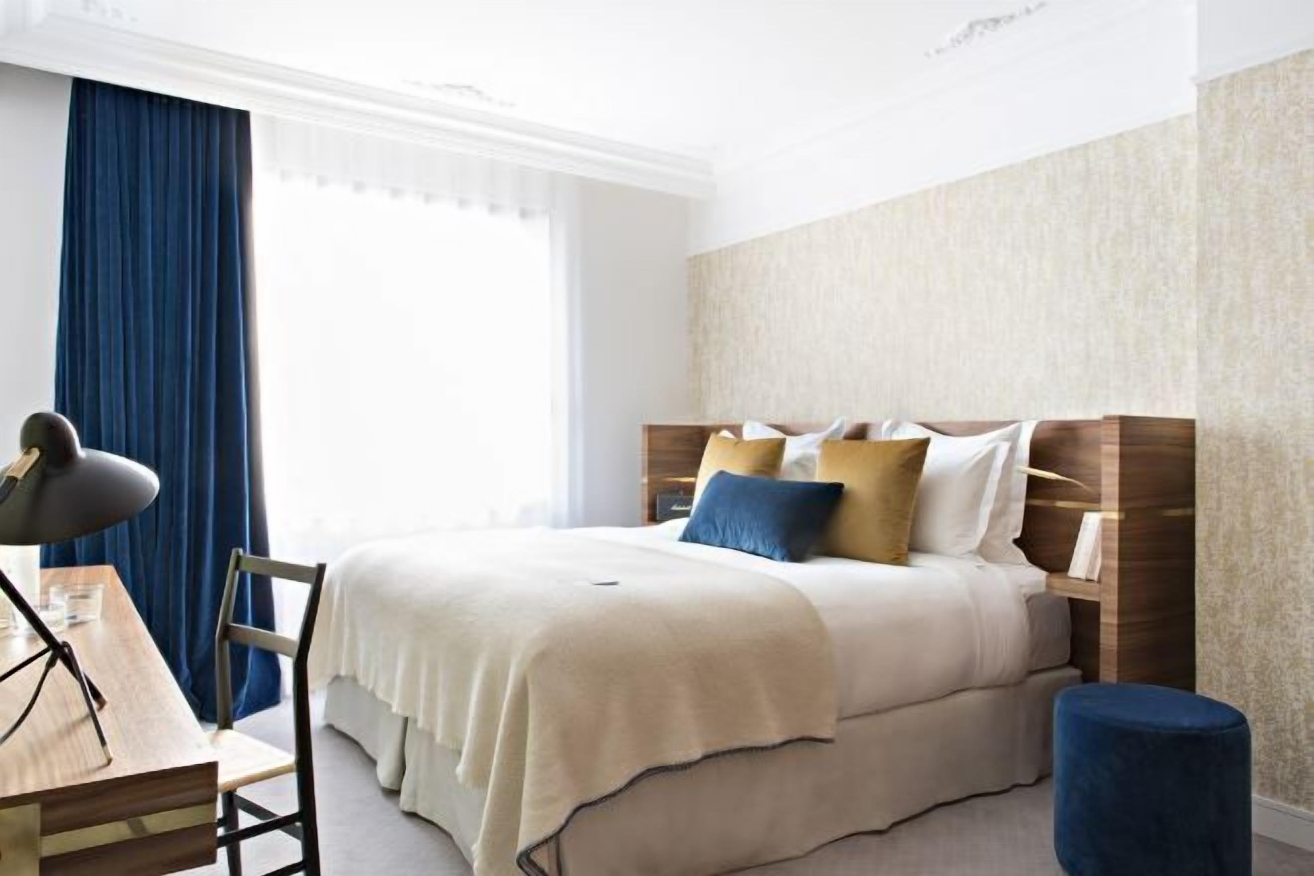 Premium bedding, down comforters, free minibar, in-room safe