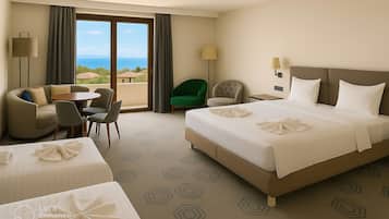 Deluxe Quadruple Room, Sea View | 1 bedroom, minibar, in-room safe, individually furnished