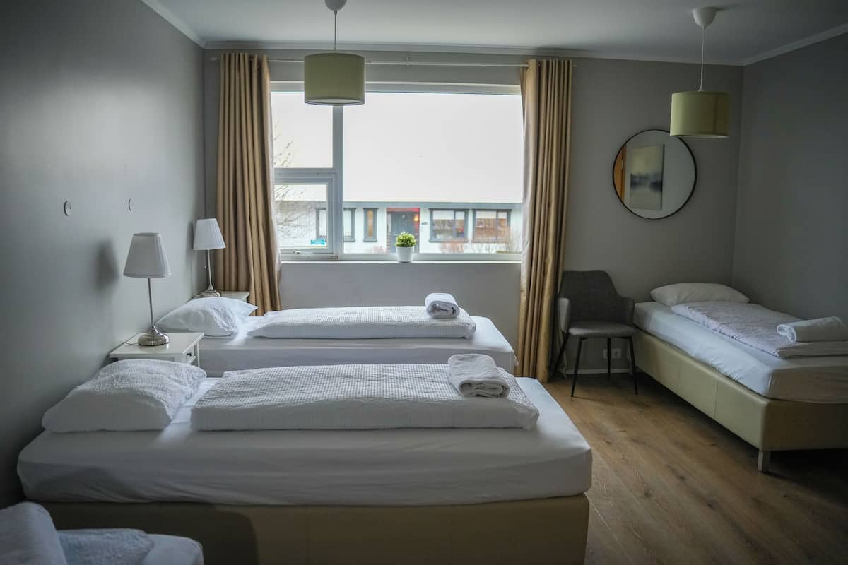 Standard Quadruple Room | 1 bedroom, blackout drapes, free WiFi, bed sheets