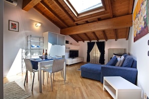 Appartement, 1 chambre | Coin séjour | Télévision à écran plat