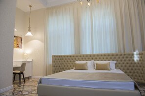 Premium bedding, minibar, in-room safe, desk