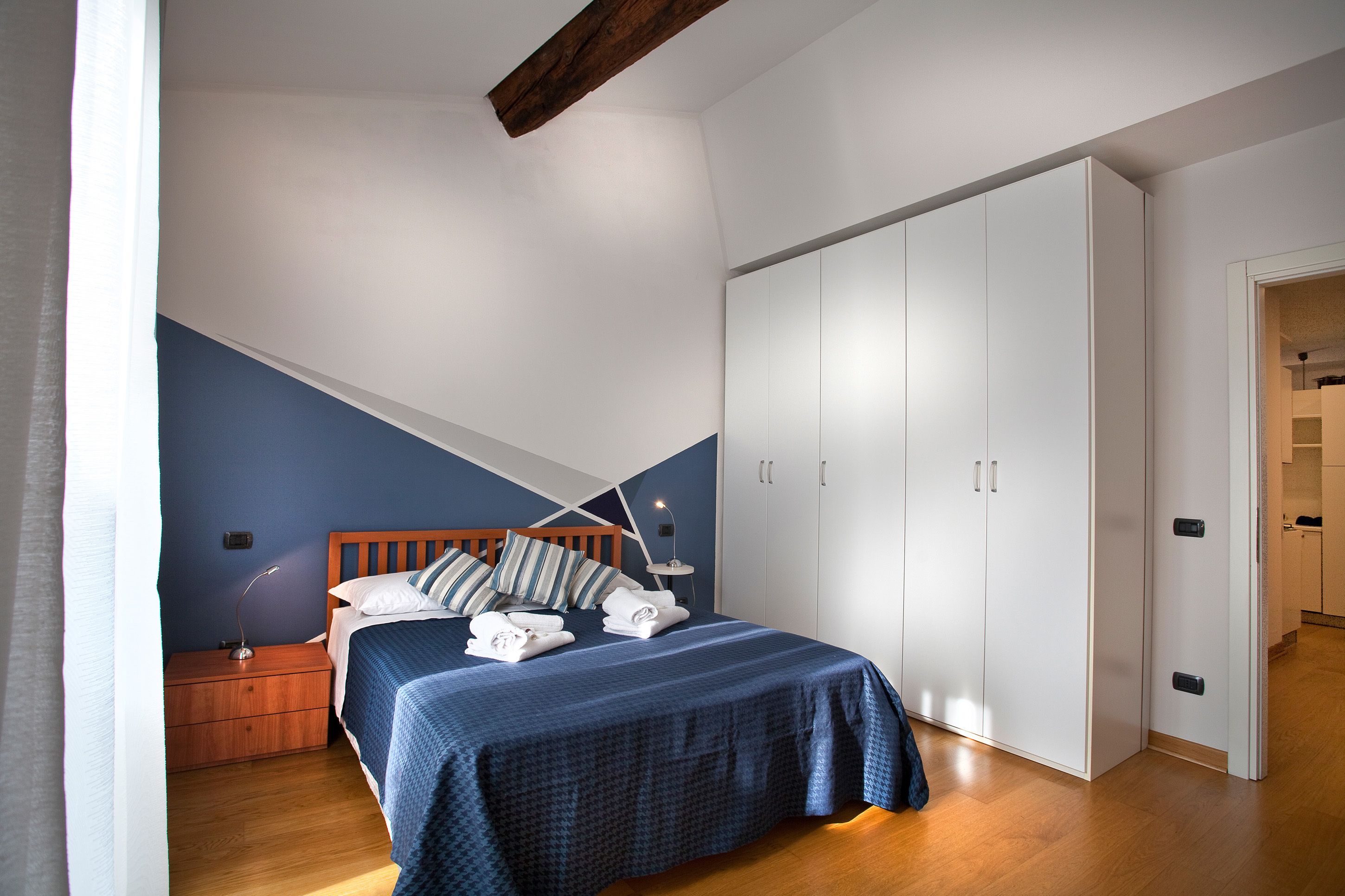 1 bedroom, desk, iron/ironing board, travel cot