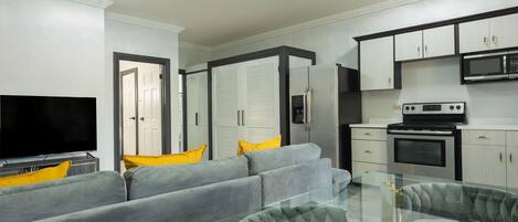 Room, 1 Queen Bed | Living area | LED TV