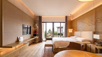 Habitación Deluxe, 1 cama de matrimonio grande, vistas parciales al mar | 1 dormitorio, ropa de cama de alta calidad, edredones de plumas