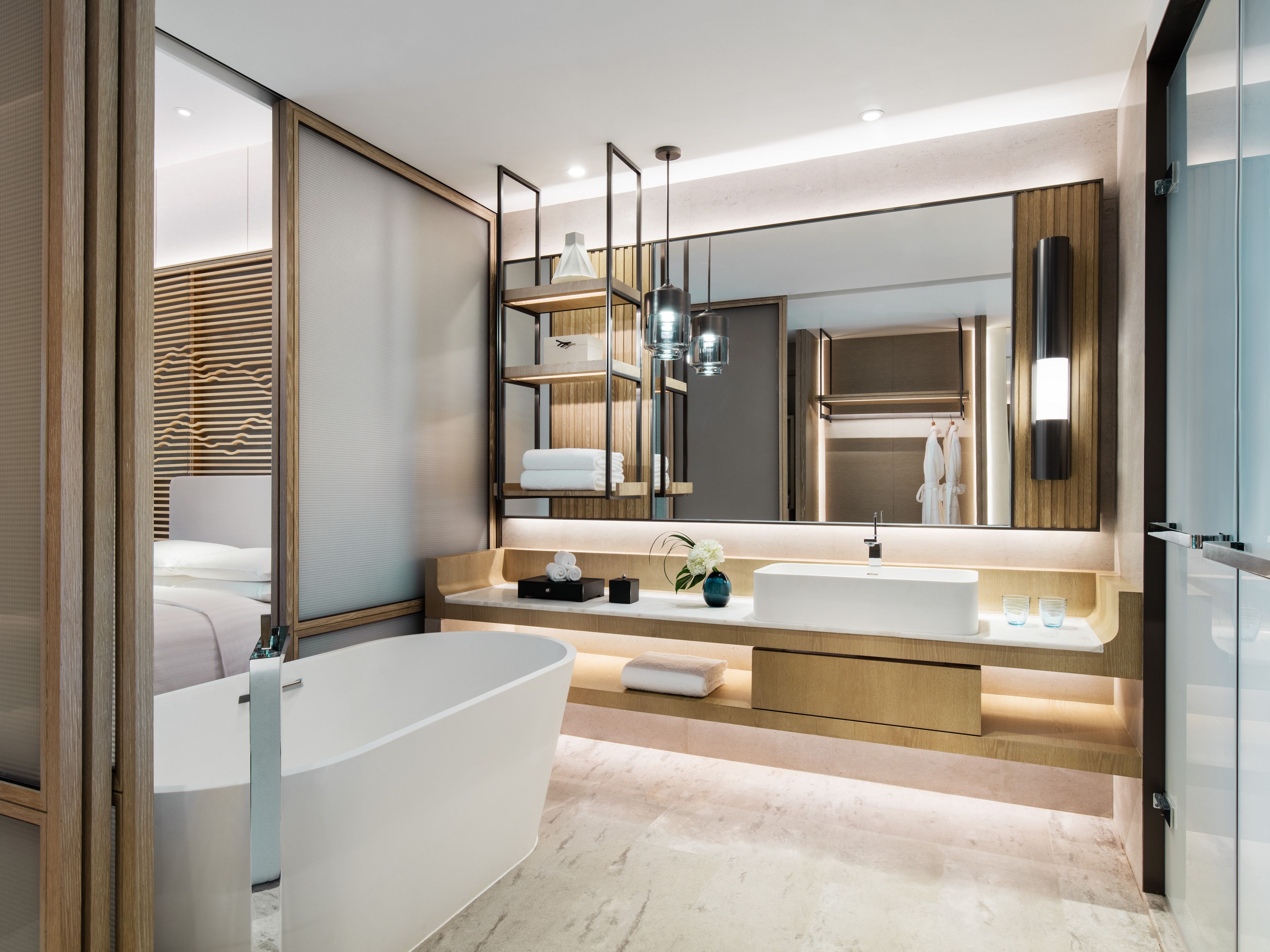 deep-soaking bathtub, rainfall showerhead, free toiletries, hair dryer