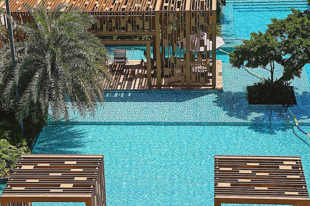 indoor pool, outdoor pool, open 7:00 am to 11:00 pm, pool umbrellas