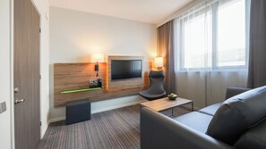 Family Room, 1 Queen Bed with Sofa bed | Living area | 42-inch flat-screen TV with digital channels, TV