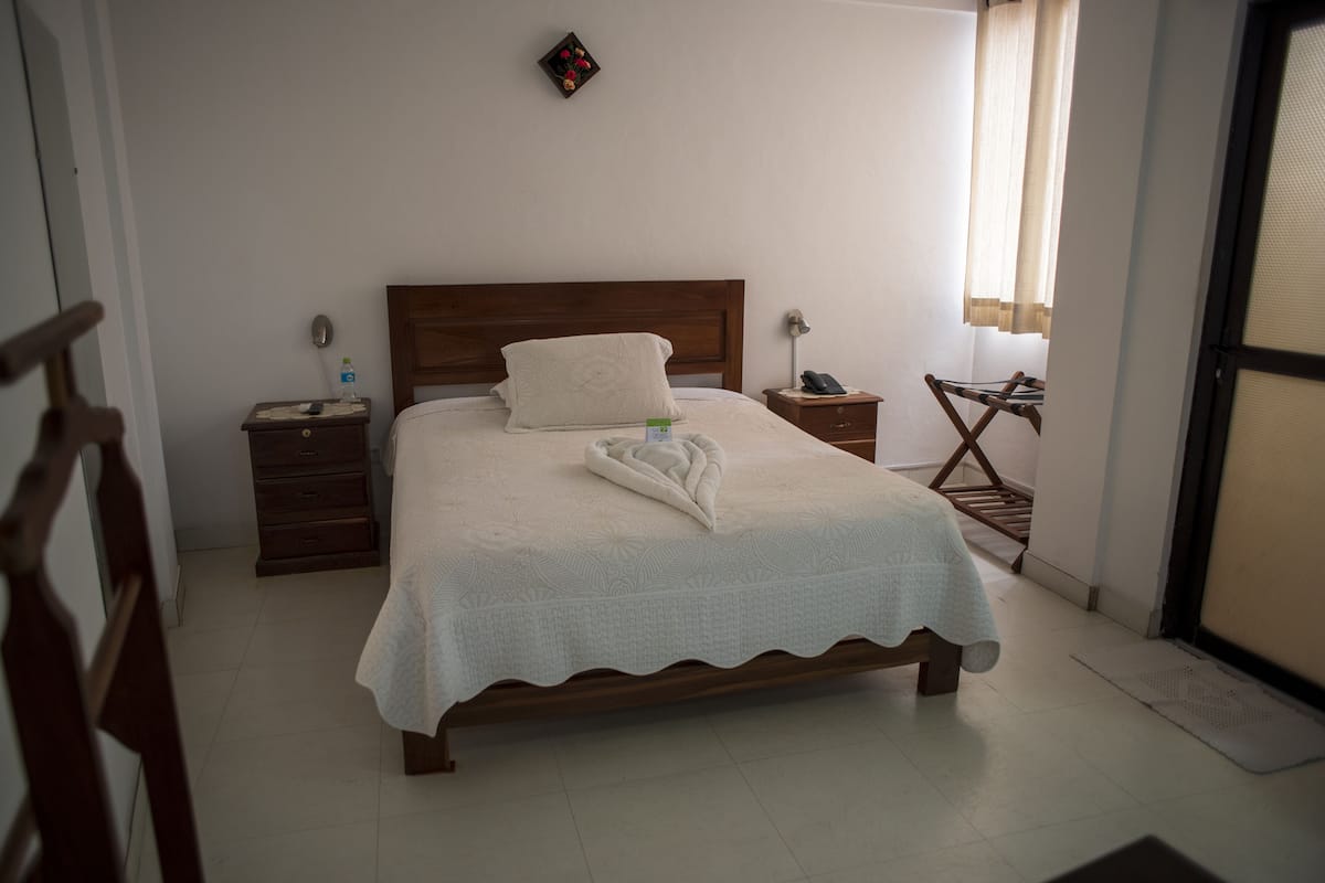 Habitación familiar | Edredones de plumas, wifi gratis, mobiliario individual y ropa de cama