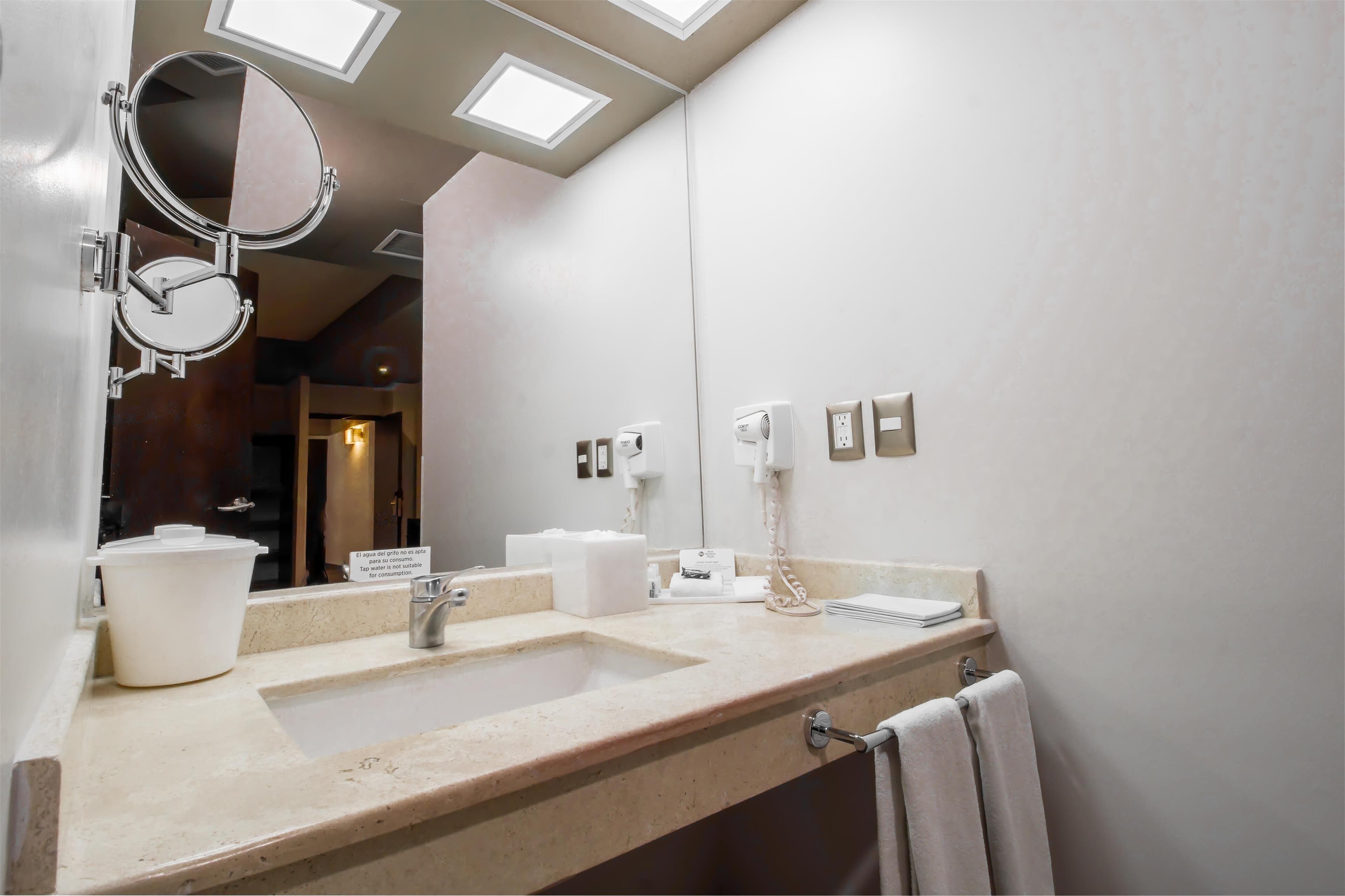 standard room, 2 queen beds, non smoking (pet friendly) | bathroom | shower, rainfall showerhead, free toiletries, hair dryer