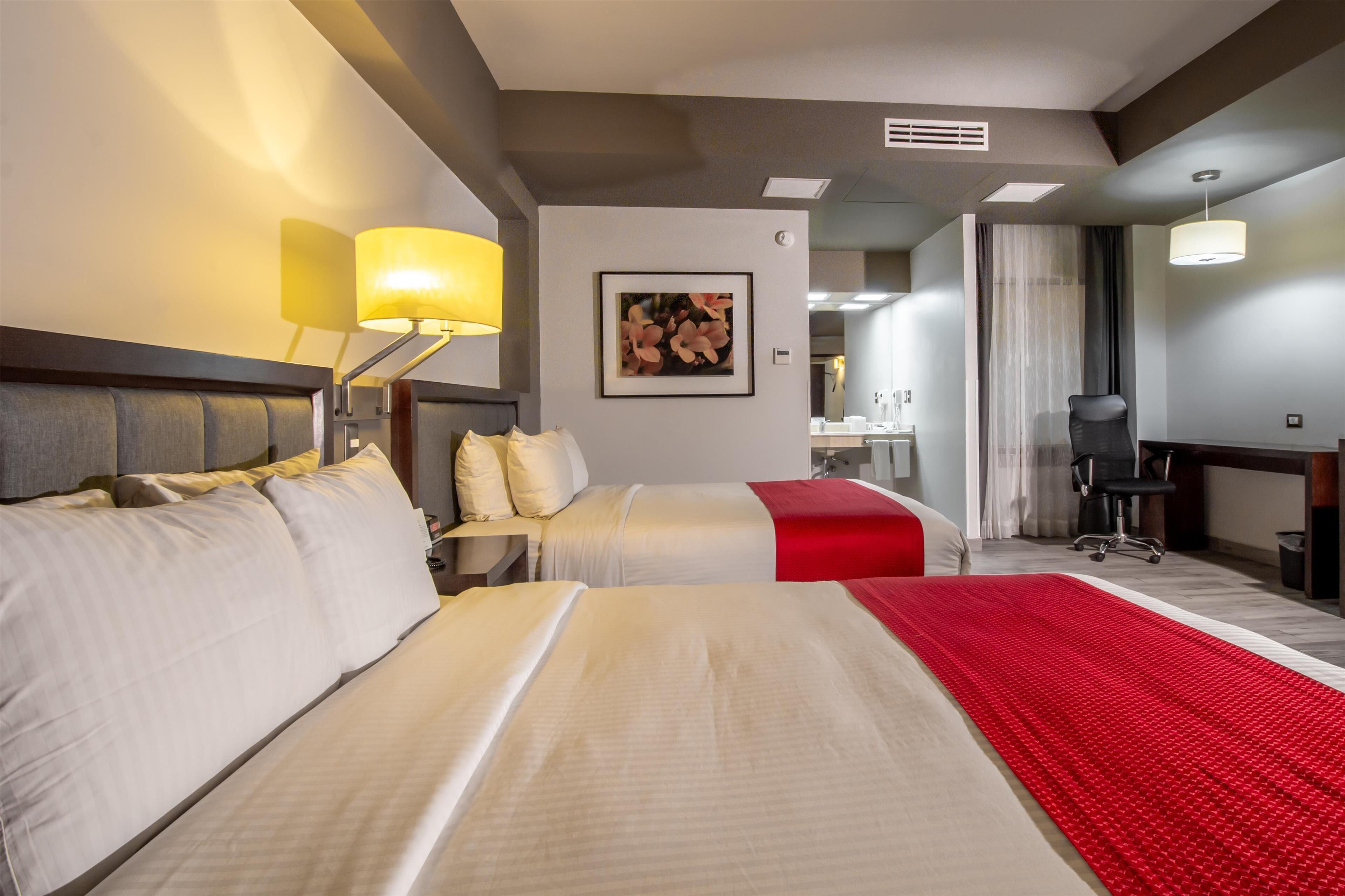 standard room, 2 queen beds, non smoking (pet friendly) | 1 bedroom, minibar, in-room safe, desk
