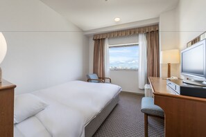 Habitación estándar doble | Caja fuerte, escritorio, wifi gratis y ropa de cama