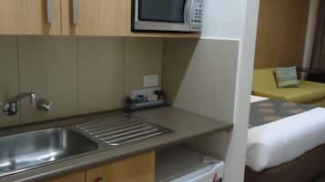 Fridge, microwave, coffee/tea maker, electric kettle