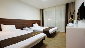 Habitación familiar con 2 camas individuales | Wifi gratis