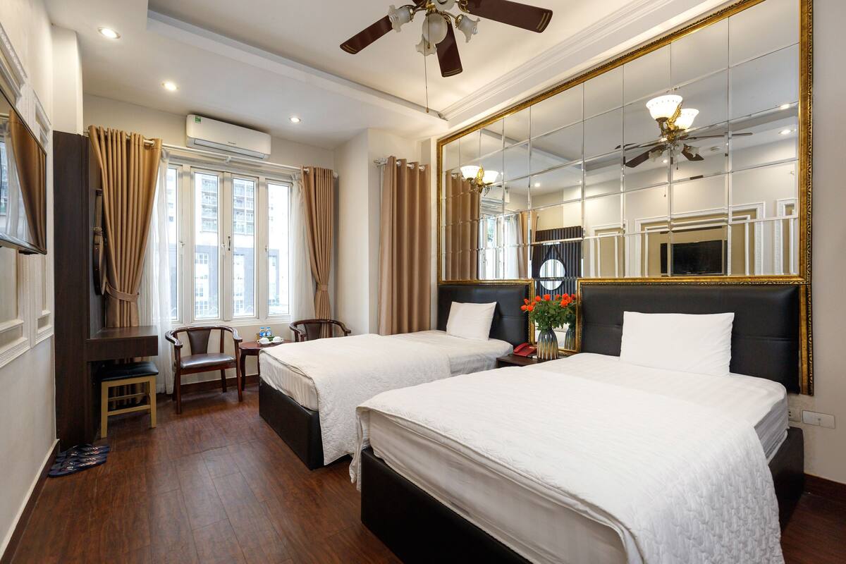 Deluxe Twin Room | 1 bedroom, minibar, desk, laptop workspace