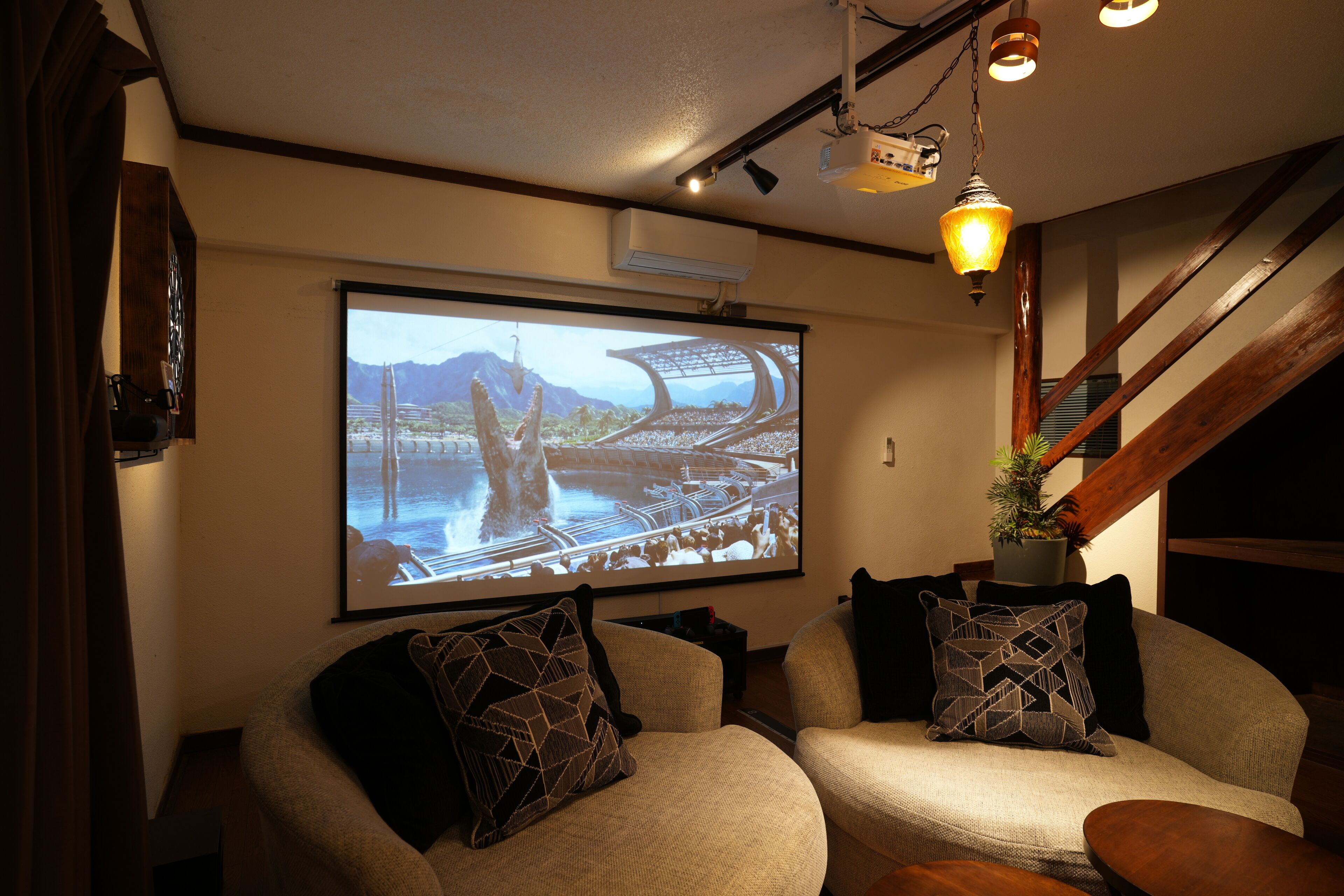 120-inch flat-screen TV with cable channels, video game console, Netflix