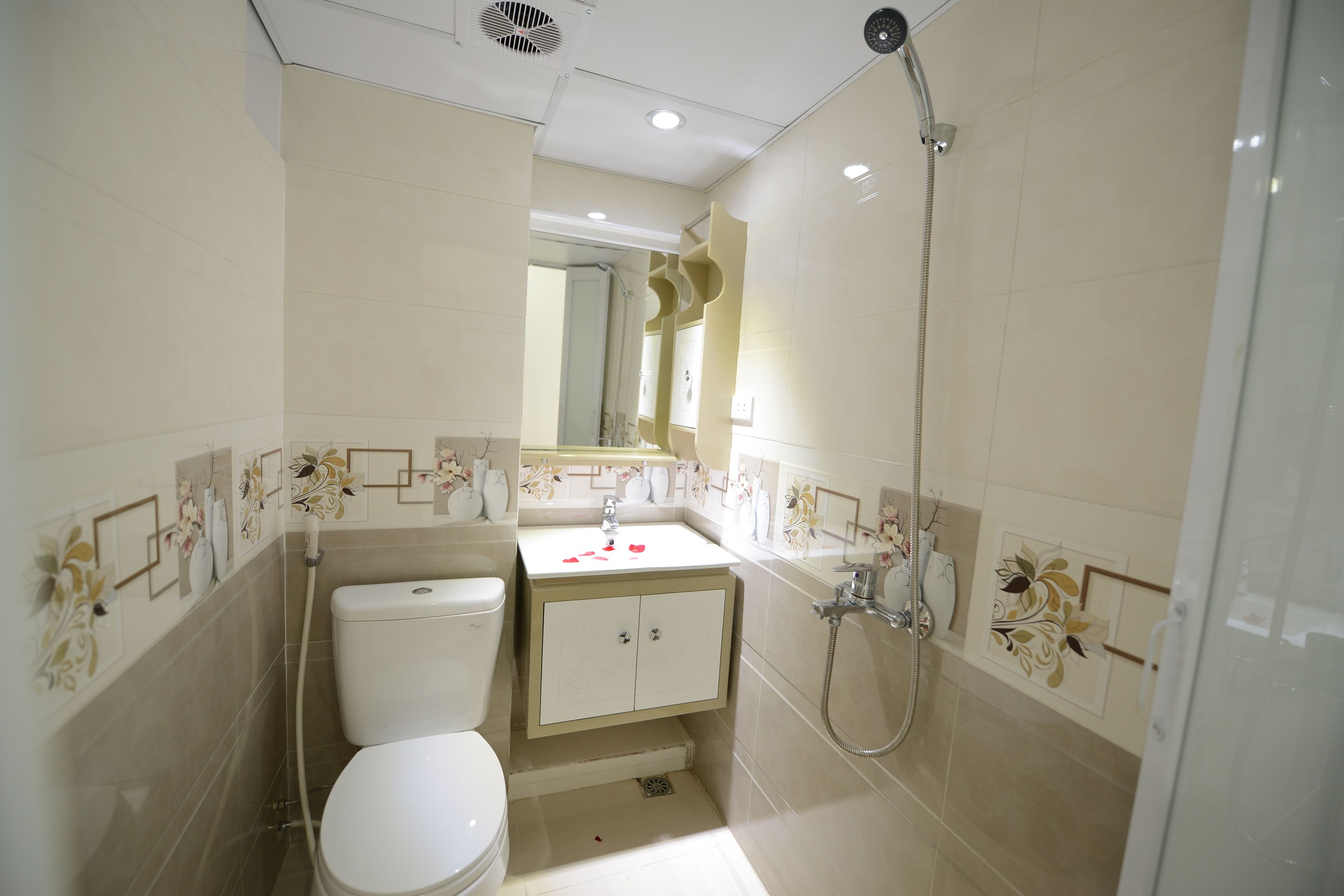 Shower, free toiletries, hair dryer, slippers