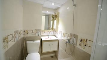 Shower, free toiletries, hair dryer, slippers