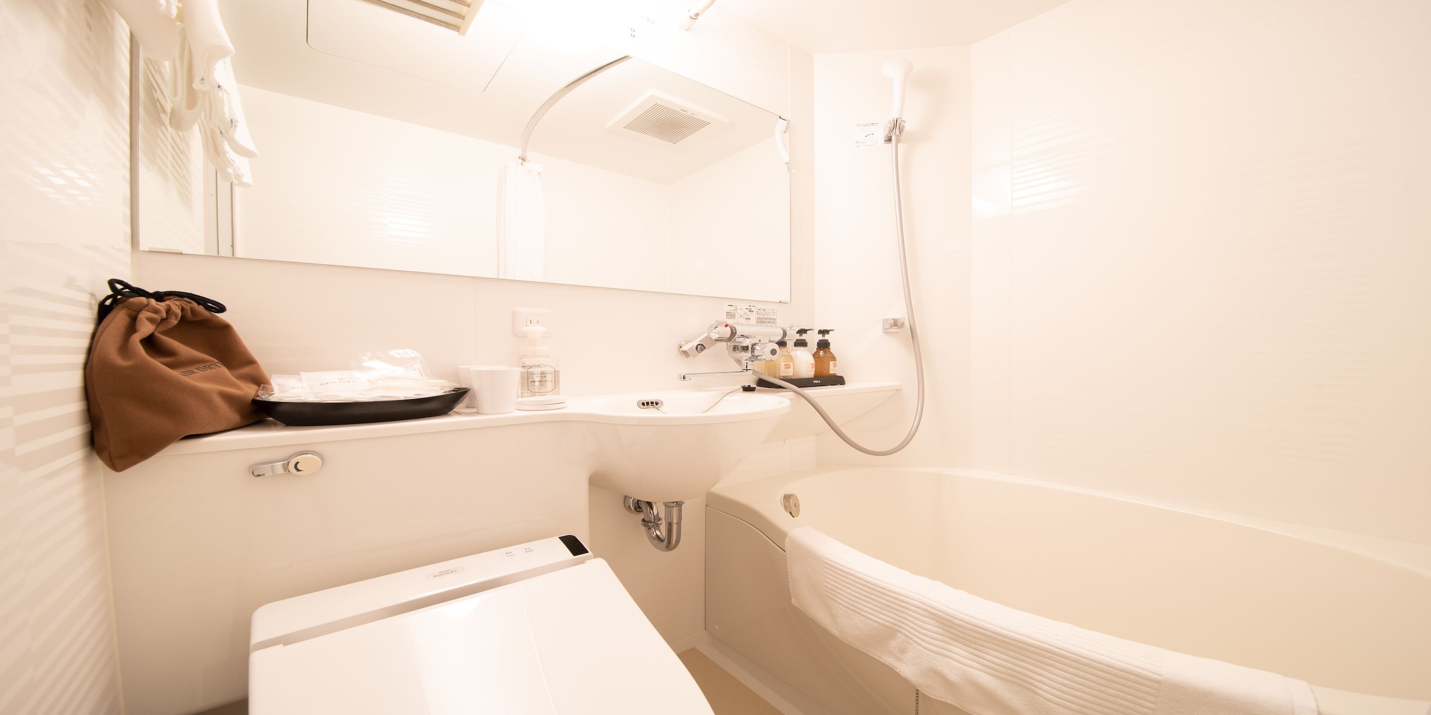 combined shower/bathtub, free toiletries, hair dryer, bathrobes