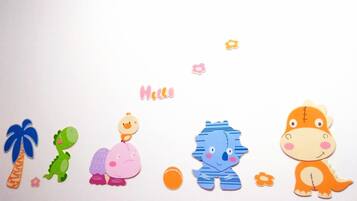 A series of cut-out animal figures arranged in a row on a white background.