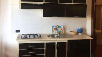 Studio, Sea View | Private kitchenette | Full-sized fridge, stovetop, cookware/dishes/utensils