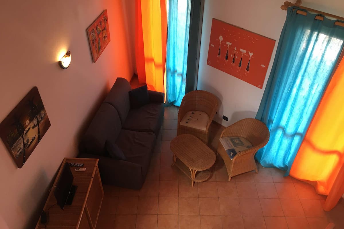 Appartement, 1 chambre, vue ville | Coin séjour | Télévision