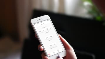A smartphone displaying a control interface with options like 'OFF' and 'ON' for various settings.