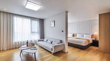 Suite (with Microwave and Washing Machine) | Premium bedding, in-room safe, blackout drapes, soundproofing