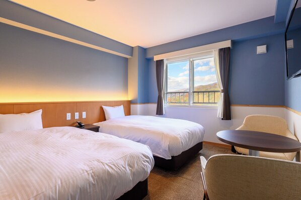 In-room safe, desk, blackout curtains, soundproofing