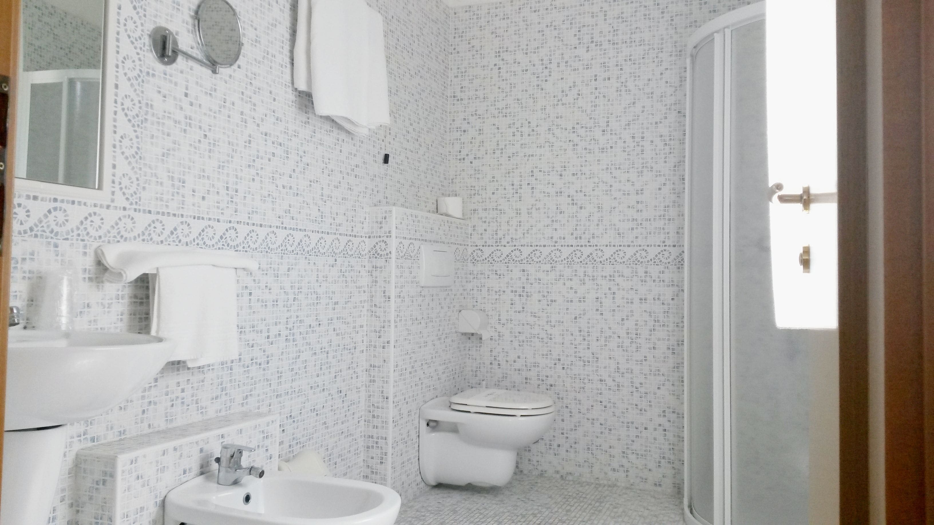 quadruple room | bathroom | shower, free toiletries, hair dryer, towels