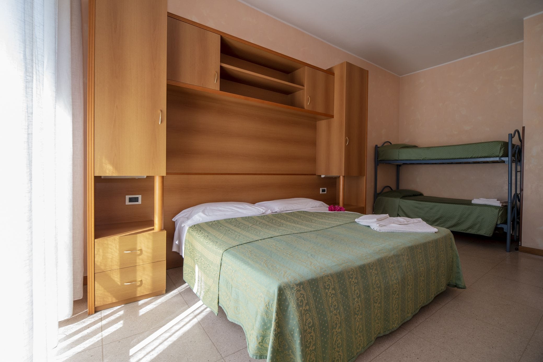 quadruple room | in-room safe, desk, laptop workspace, cots/infant beds