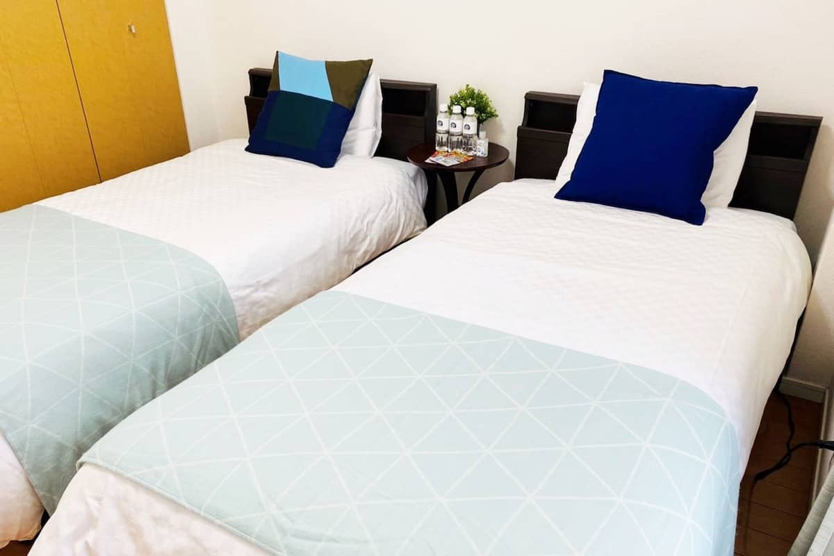 Blackout curtains, iron/ironing board, free WiFi, bed sheets