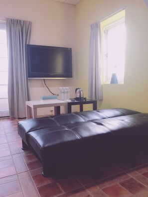 Blackout curtains, rollaway beds, free WiFi