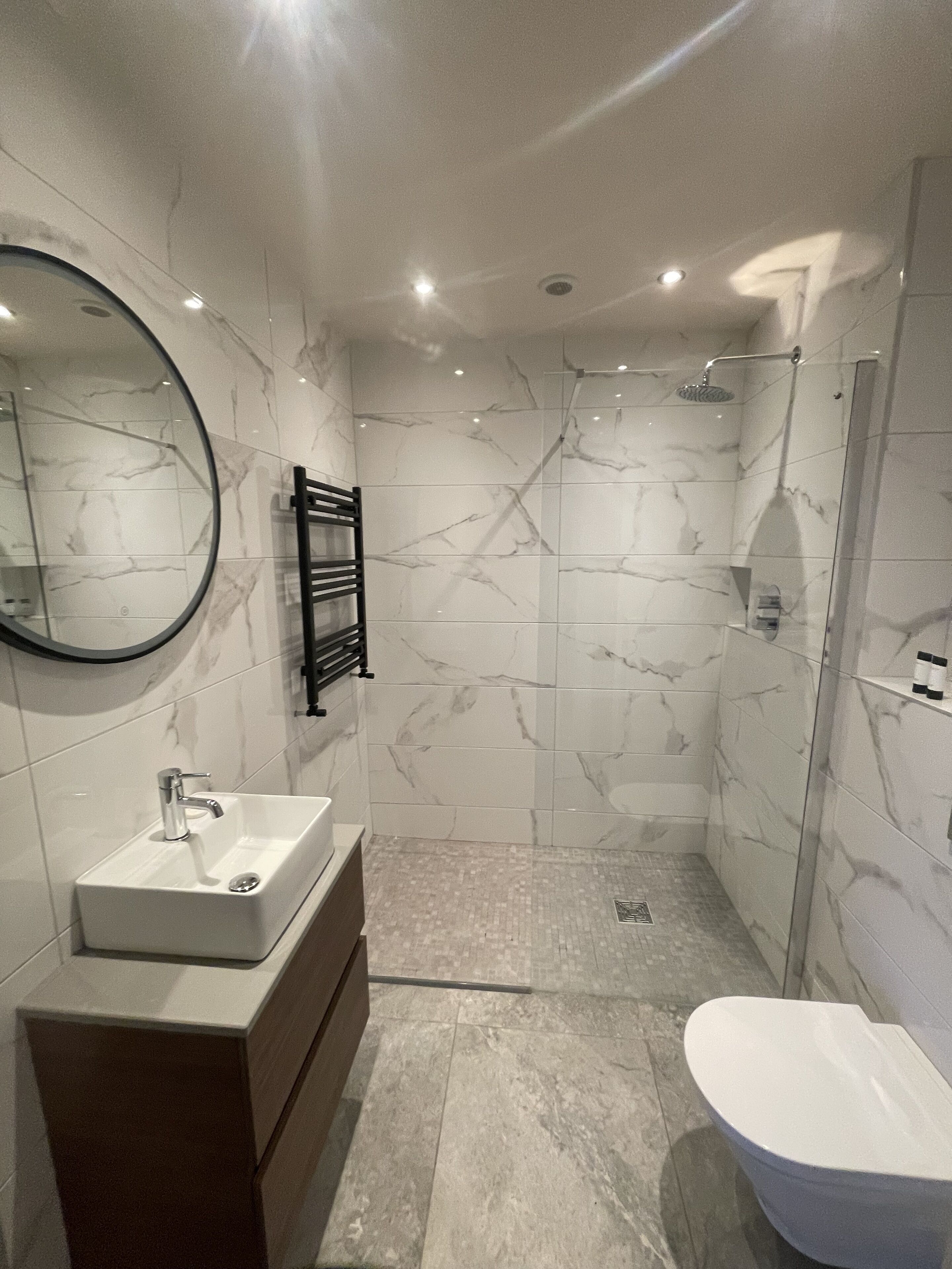 superior double room | bathroom | free toiletries, hair dryer, towels