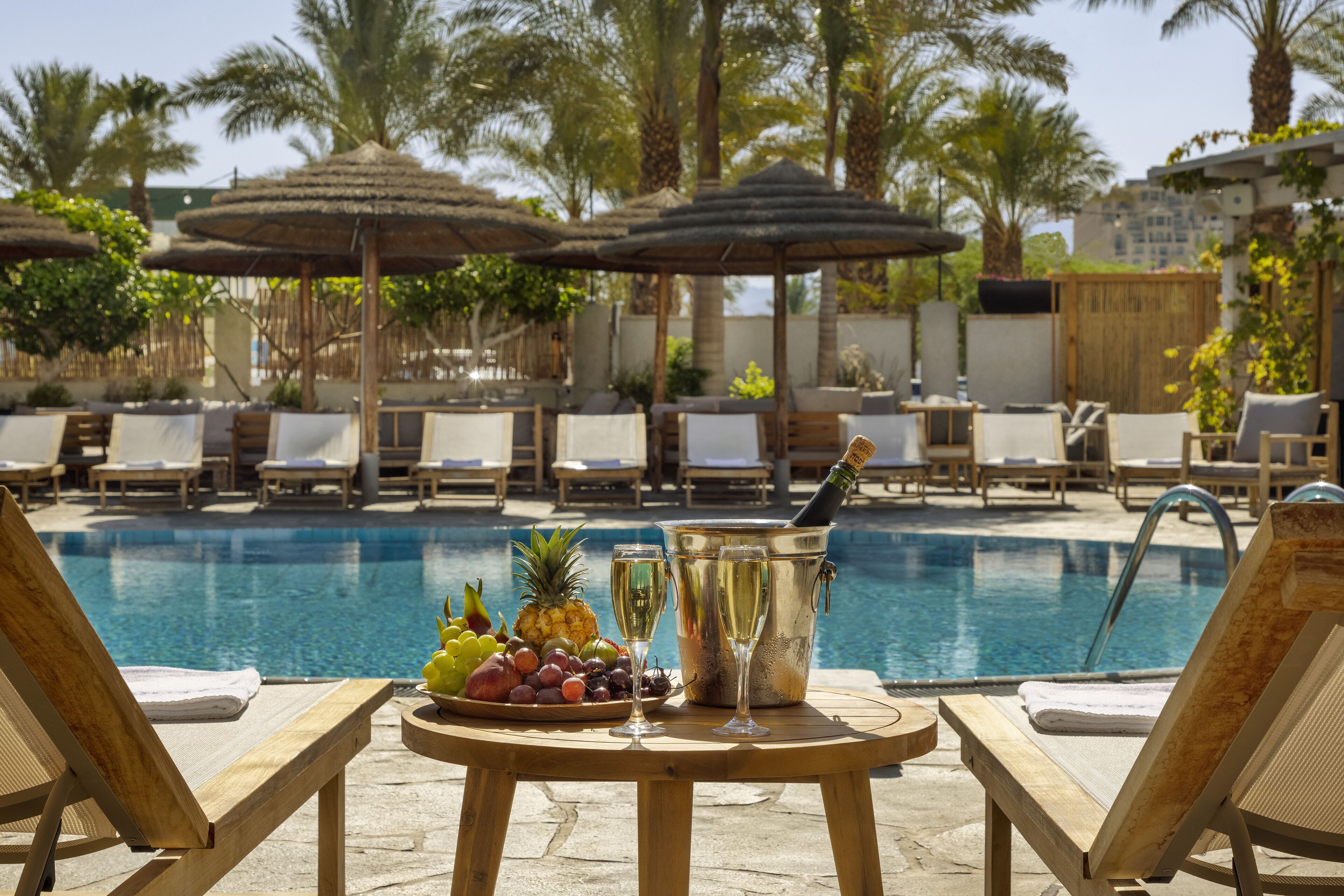 outdoor pool, open 9:00 am to 5:00 pm, pool loungers