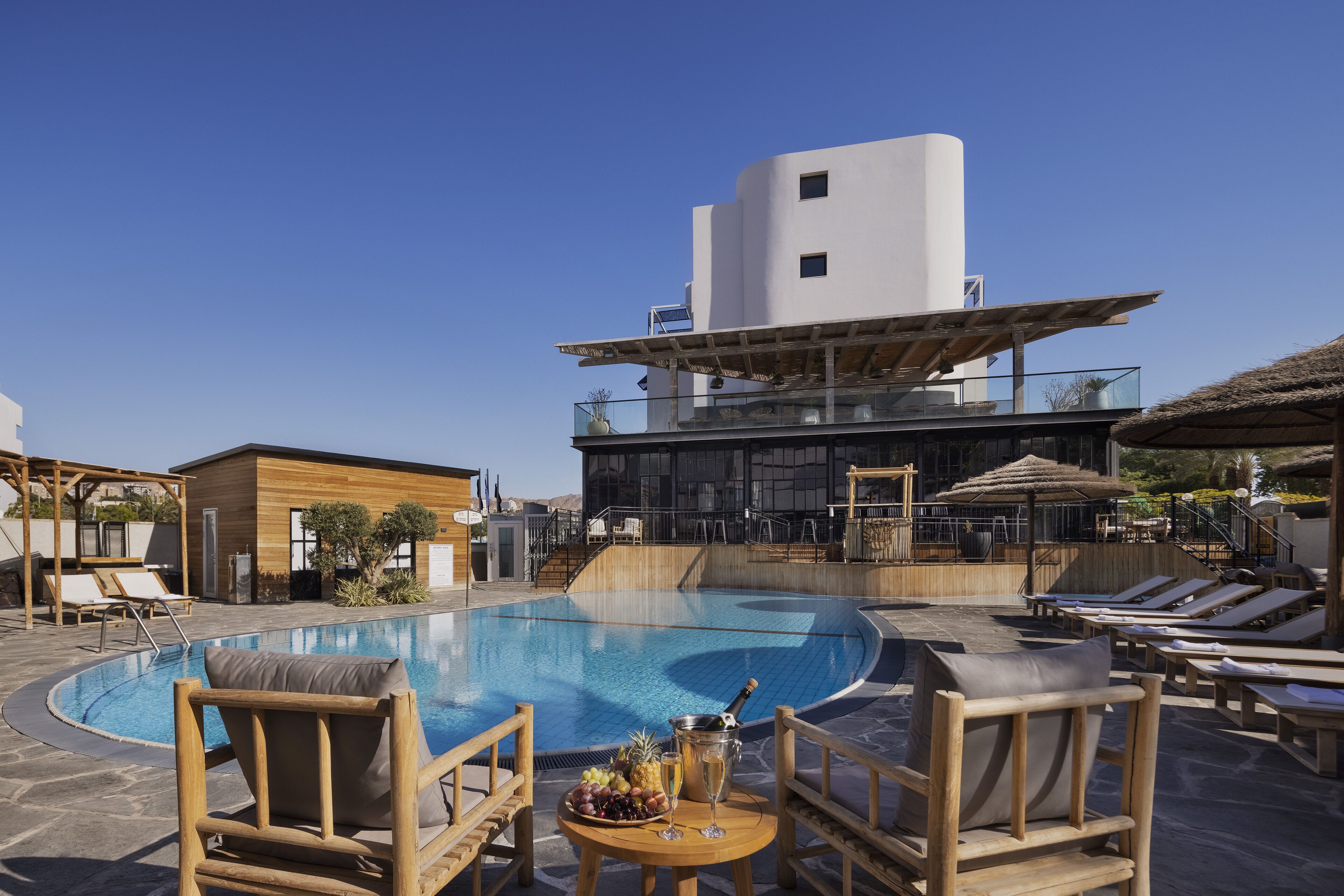 outdoor pool, open 9:00 am to 5:00 pm, pool loungers