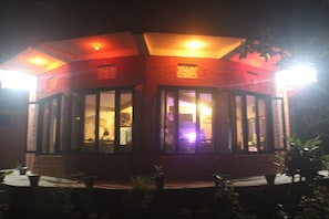 Front of property - evening/night - Safari Wildlife Lodge & Camp (Sauraha)