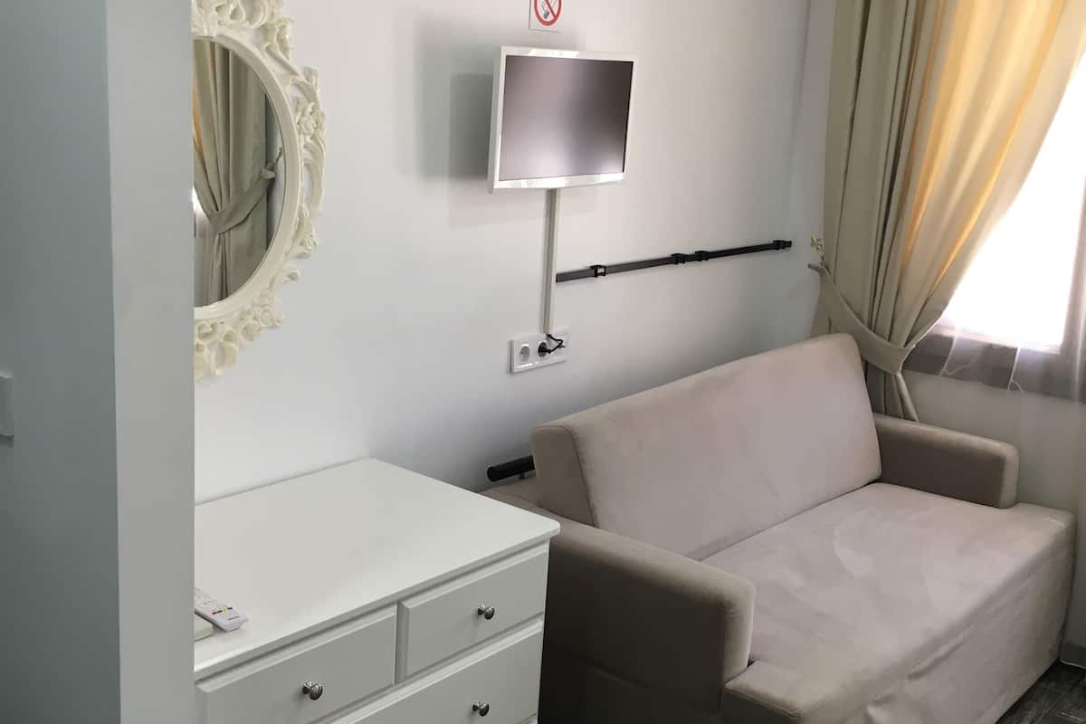 elite quadruple room, 1 bedroom, garden view | free minibar, desk, soundproofing, rollaway beds