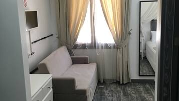 Elite Quadruple Room, 1 Bedroom, Garden View | Free minibar, desk, soundproofing, rollaway beds