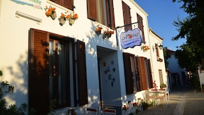 A boutique hotel with a sign reading "Novia Boutique Hotel & More." - Nova Citrus Hotel (Seferihisar)