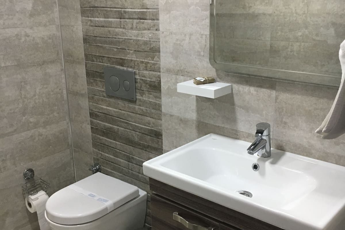 elite quadruple room, 1 bedroom, garden view | free minibar, desk, soundproofing, rollaway beds