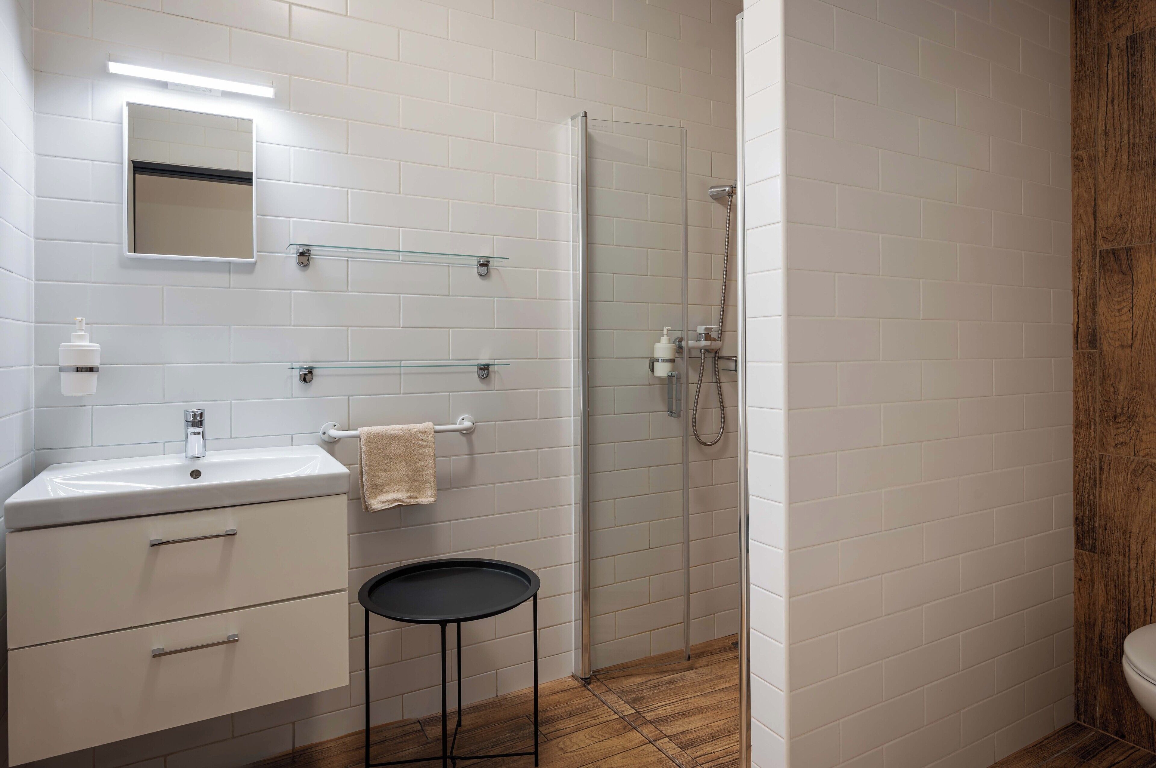 superior room, ensuite, courtyard area | bathroom | shower, free toiletries, hair dryer, towels