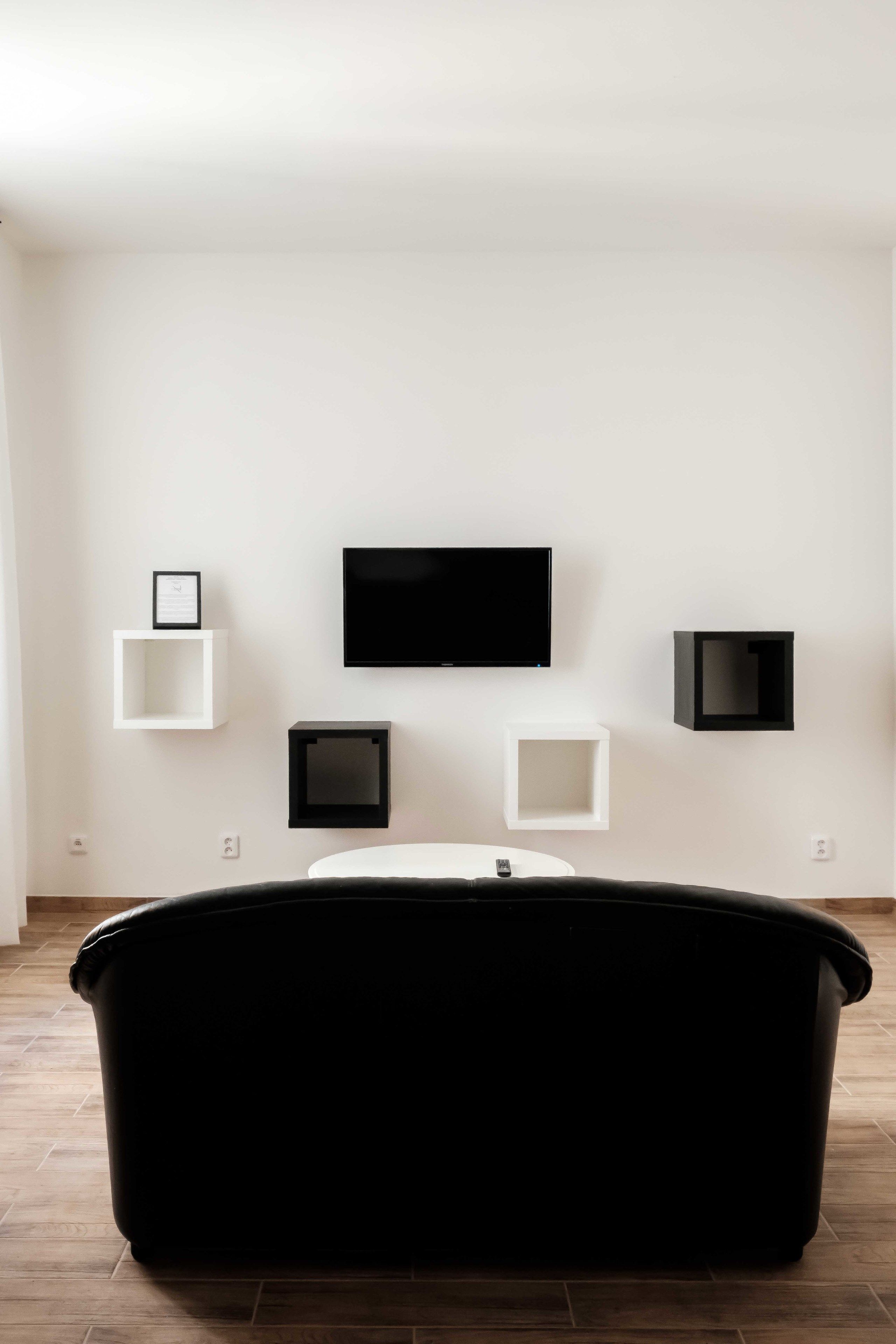 superior room, ensuite, courtyard area | living area | flat-screen tv