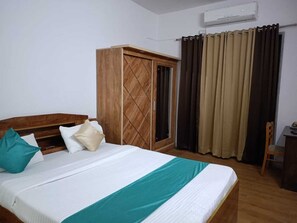 Budget Non Ac Room | Free WiFi, bed sheets - Happy Stay Service Apartment (Pune)