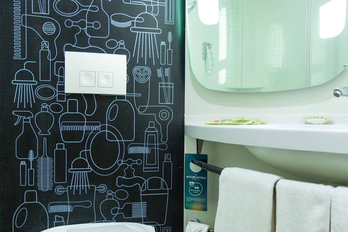 shower, eco-friendly toiletries, hair dryer, slippers