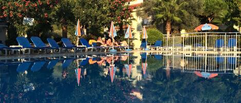 Outdoor pool, pool umbrellas, pool loungers