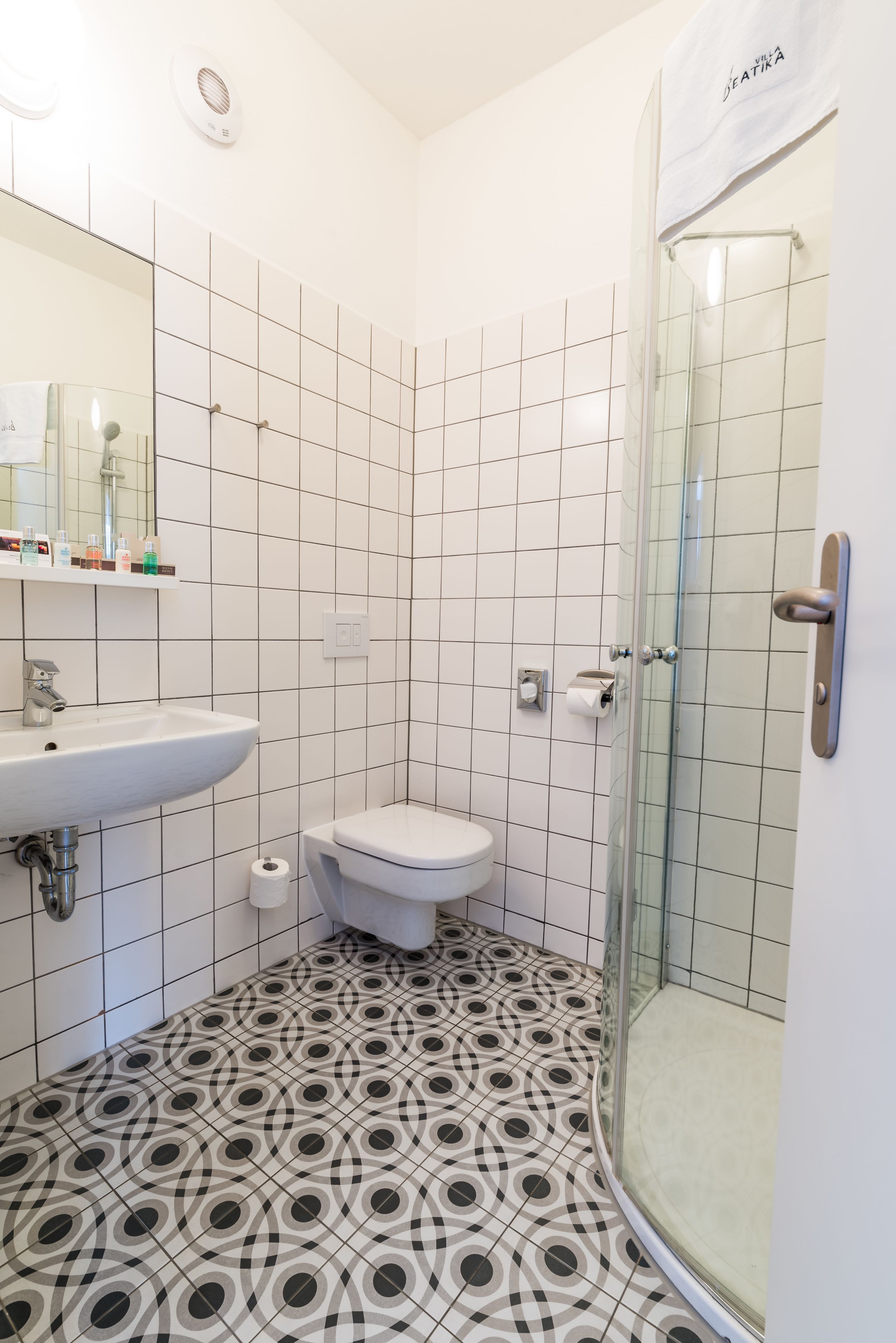 executive double room, city view (tina turner) | bathroom | shower, designer toiletries, hair dryer, bathrobes